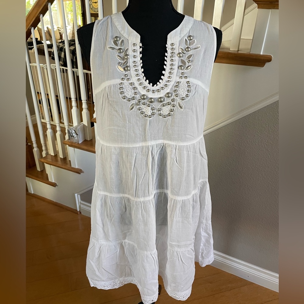 White dress with silver embellishments
